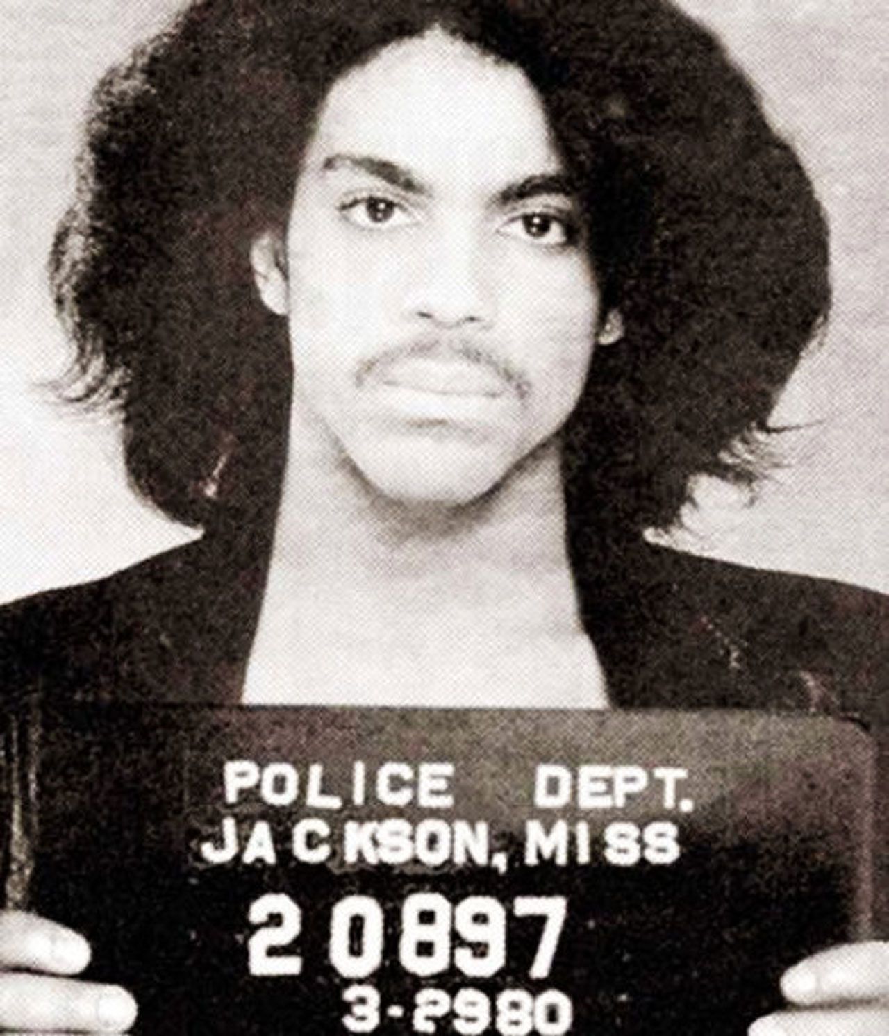 Prince. Arrested 1980 after his keyboard player Dr Fink stole an emergency megaphone from an airplane. Released without charge after posing for pictures.