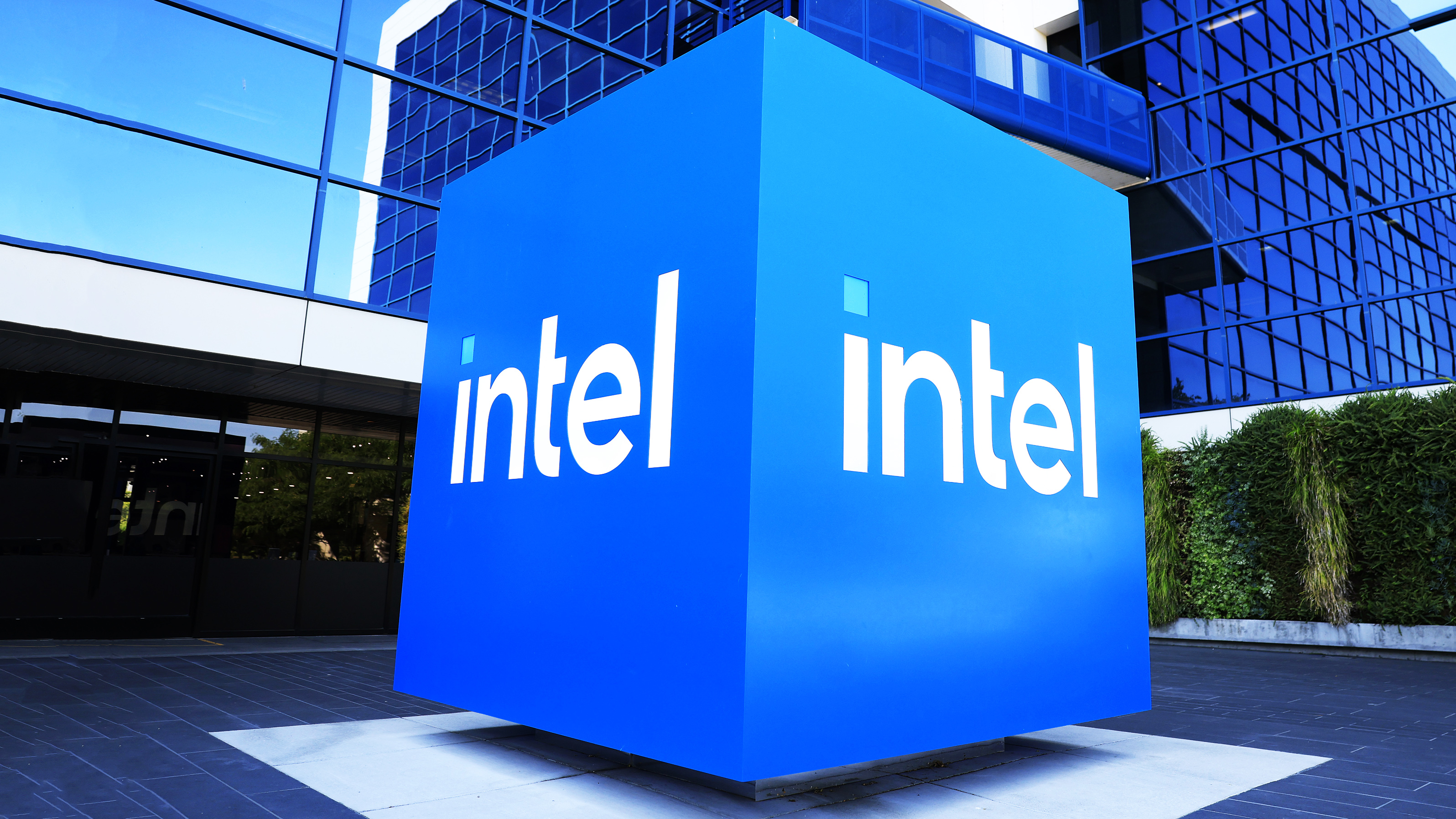 SANTA CLARA, CALIFORNIA - JULY 16: The Intel logo is displayed on a sign in front of Intel headquarters on July 16, 2025 in Santa Clara, California. Intel is laying off nearly 4,000 employees in offices across the United States in the coming weeks as part of a company-wide cost-cutting push led by new CEO Lip-Bu Tan. (Photo by Justin Sullivan/Getty Images)