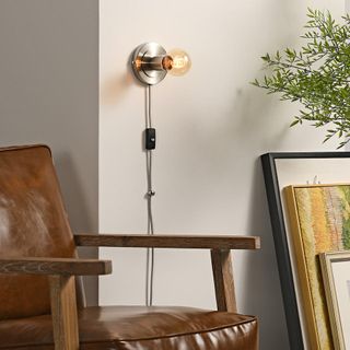 A leather chair with phone cord cable clips