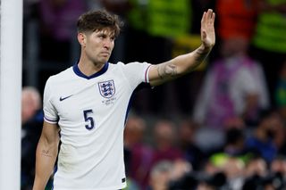 John Stones of England signals during the UEFA EURO 2024 semi-final match between Netherlands and England at Football Stadium Dortmund on July 10, 2024 in Dortmund, Germany.