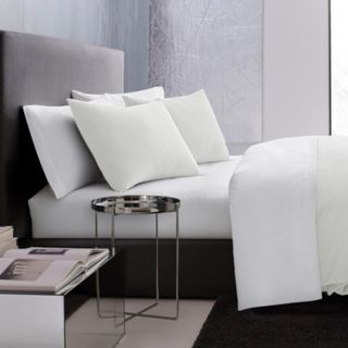 Vera Wang Cotton Pique Comforter Set on a bed.