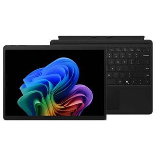 Black Microsoft Surface Pro 11 with keyboard against a white background