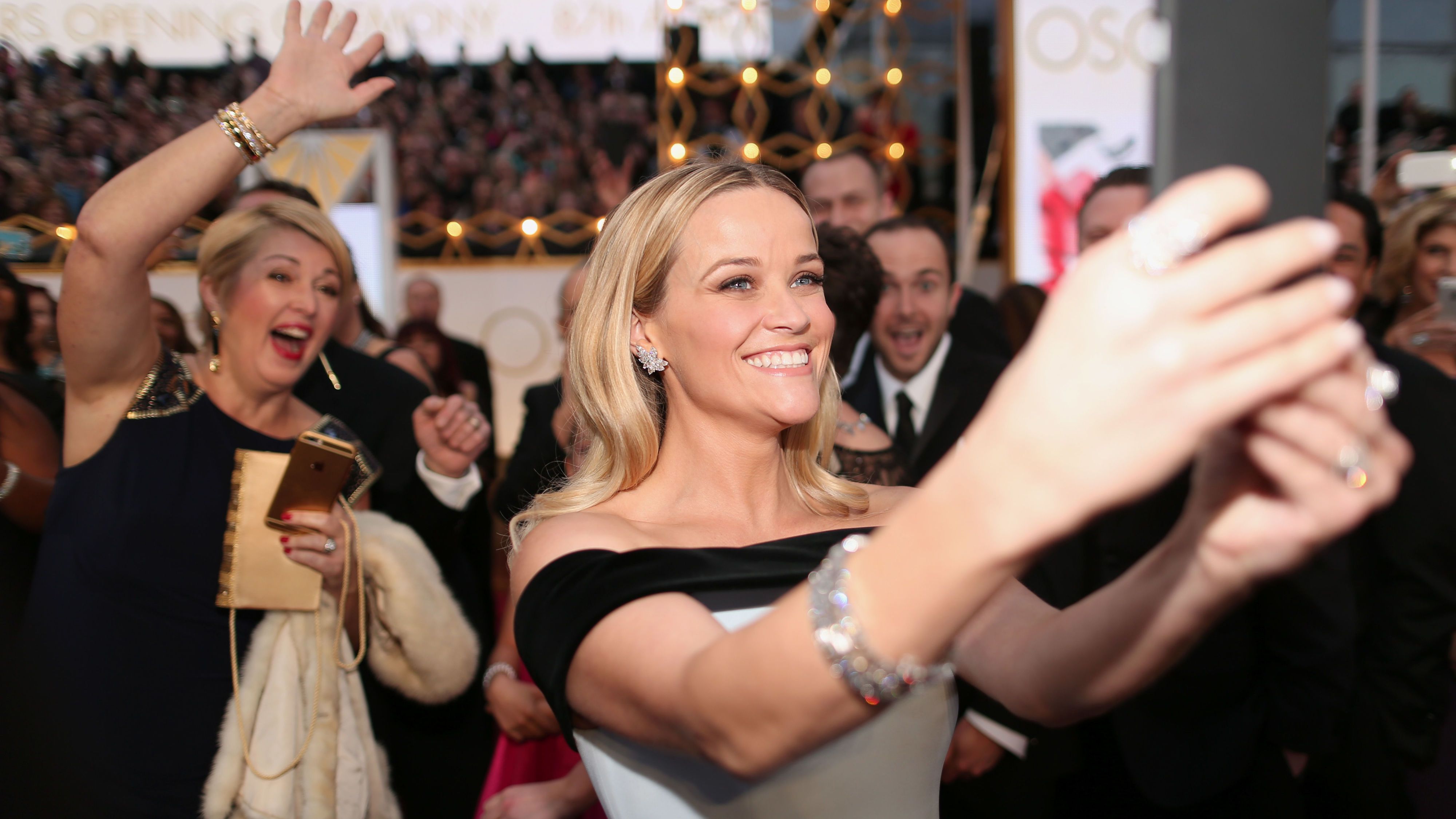 Arm, Event, Hand, Happy, Fashion accessory, Celebrating, Crowd, Party, Audience, Blond,