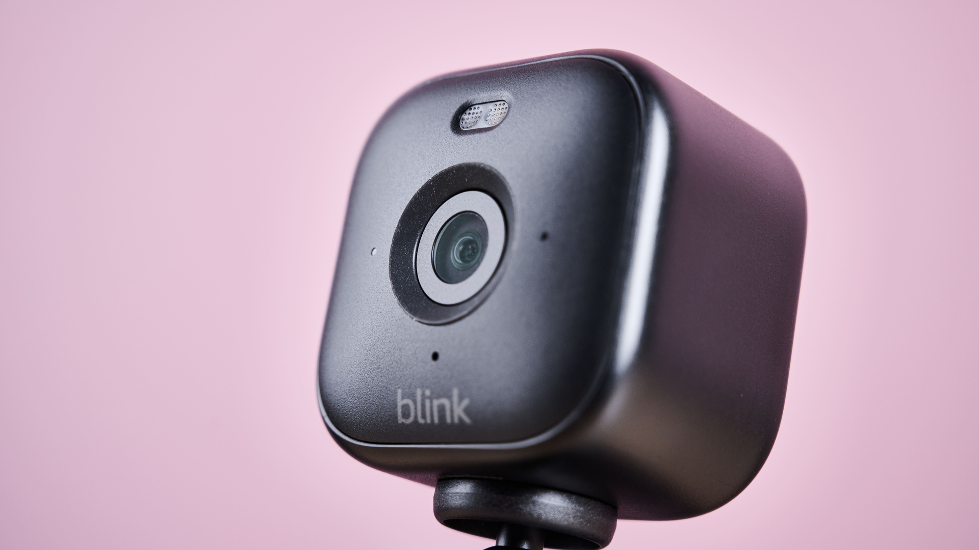 A close-up of the front of the Blink Mini 2, shows the camera and spotlight.