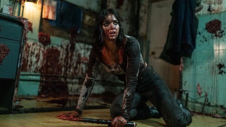 Melissa Barrera as 'Joey' in Abigail