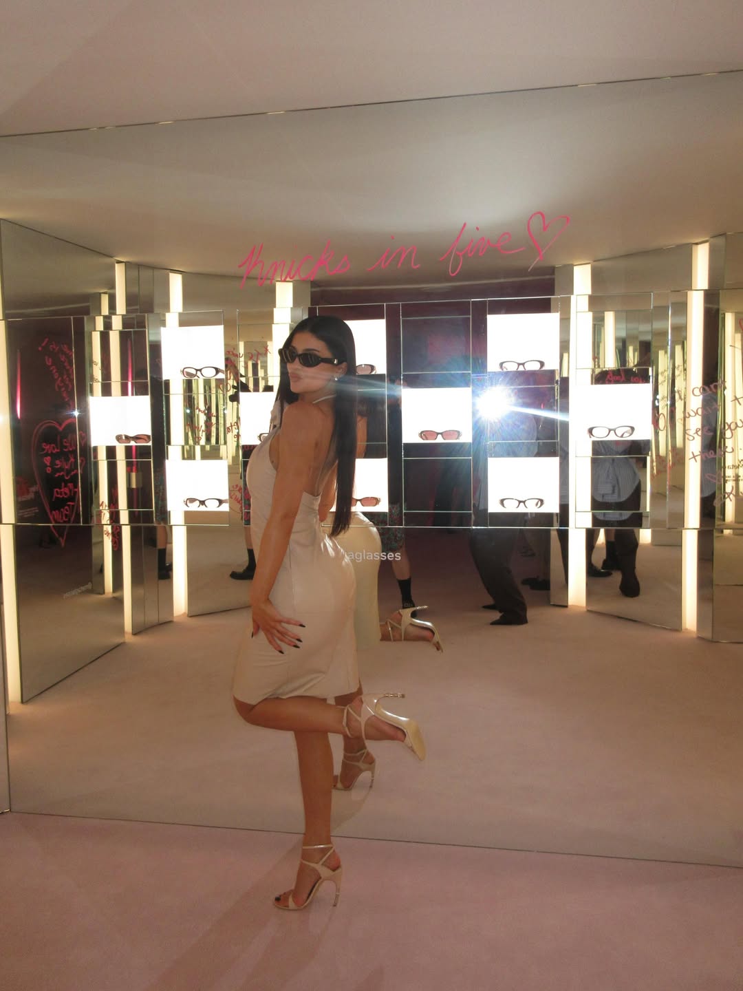 Kylie Jenner wore a vintage Gucci by Tom Ford summer dress to celebrate the launch of her Meta sunglasses