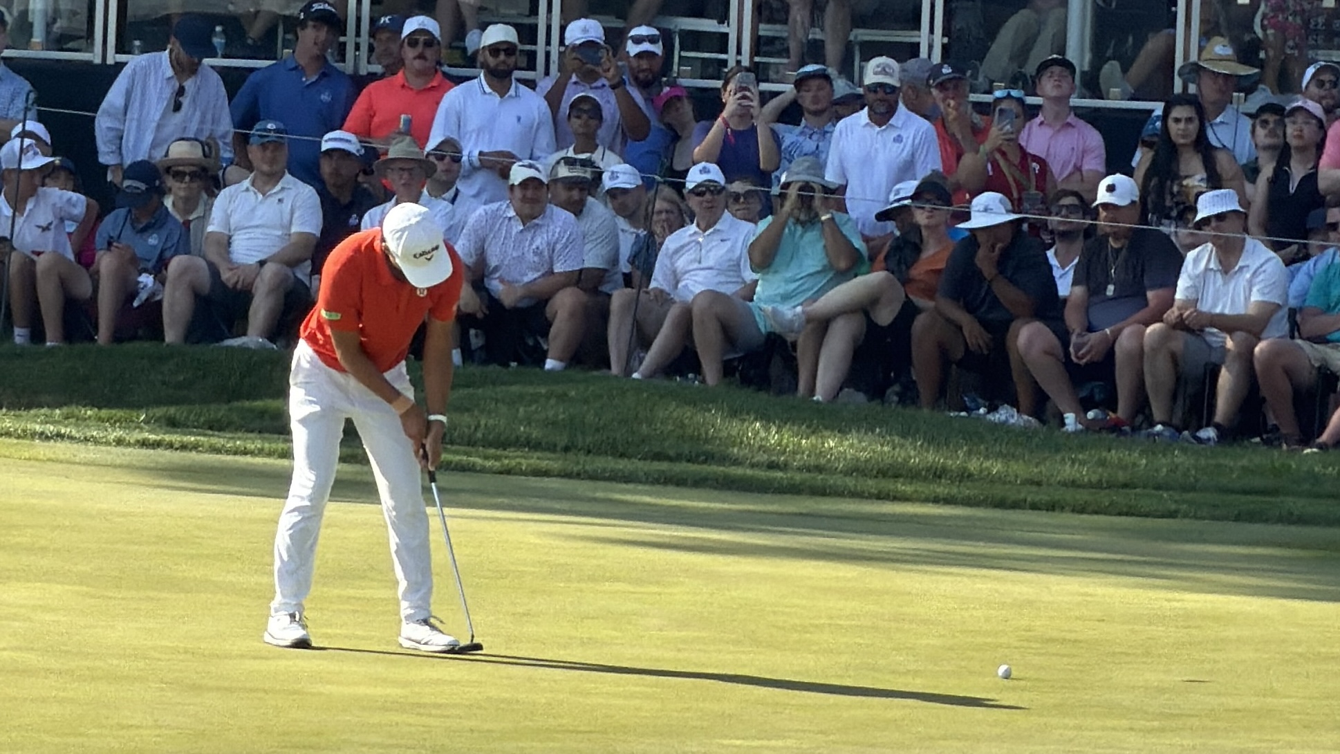 A golfer putting