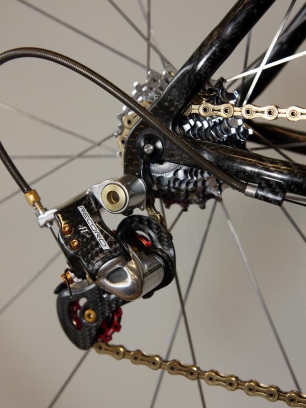 The Campagnolo Record rear derailleur on Fairwheel Bikes' ultralight Spin carbon road bike has been heavily massaged - though Campagnolo's newer Super Record unit might even be lighter.