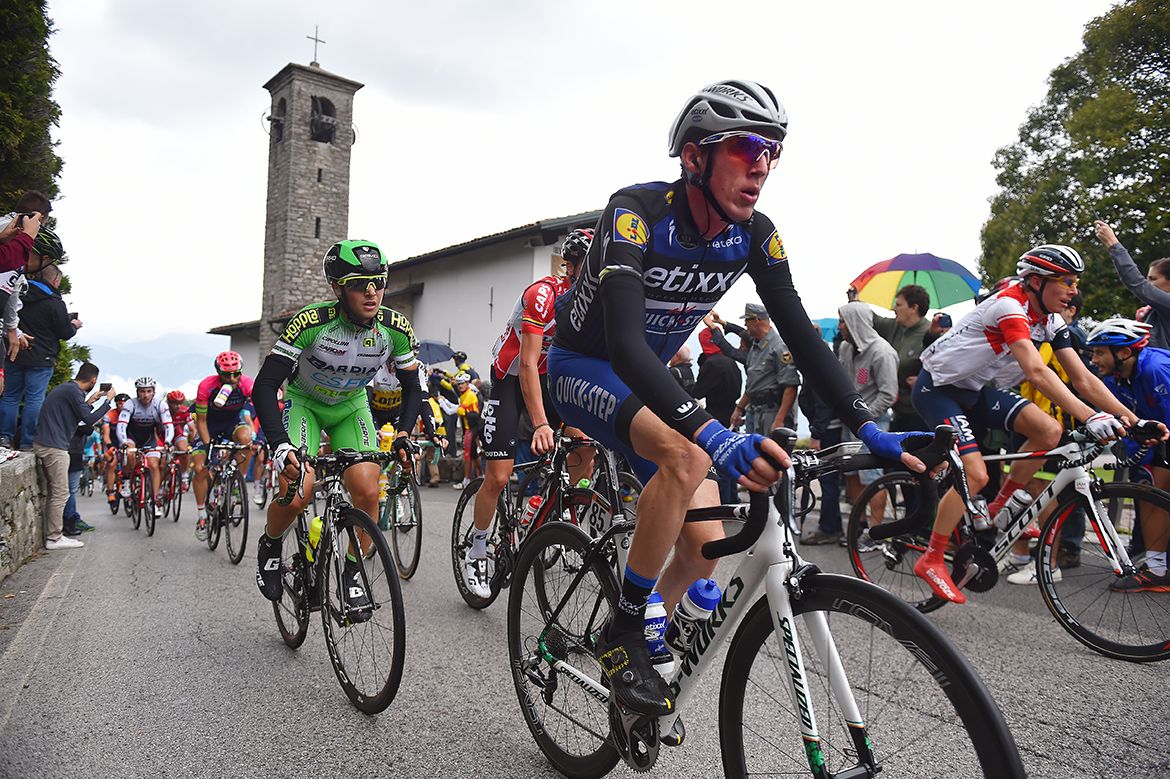 Dan Martin (Etixx-Quickstep) crests the Ghisallo