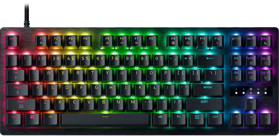 Razer Huntsman V3 Pro TKL 8KHz with vibrant RGB backlighting. Keys are illuminated in a spectrum of colors, creating a dynamic and tech-savvy atmosphere.