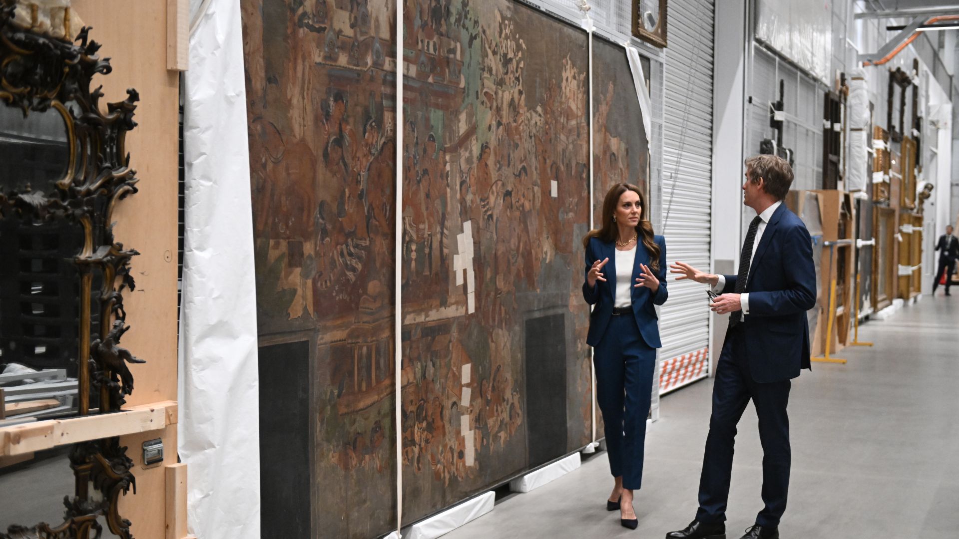 Catherine, Princess of Wales talks with Tristram Hunt Director of The V&A during a visit to the V&A East Storehouse on June 10, 2025