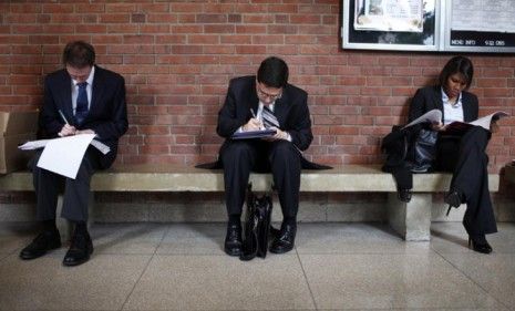 Job seekers fill out applications during a career fair in New Jersey: The June jobs report is out, and the numbers are &amp;quot;dismal.&amp;quot;