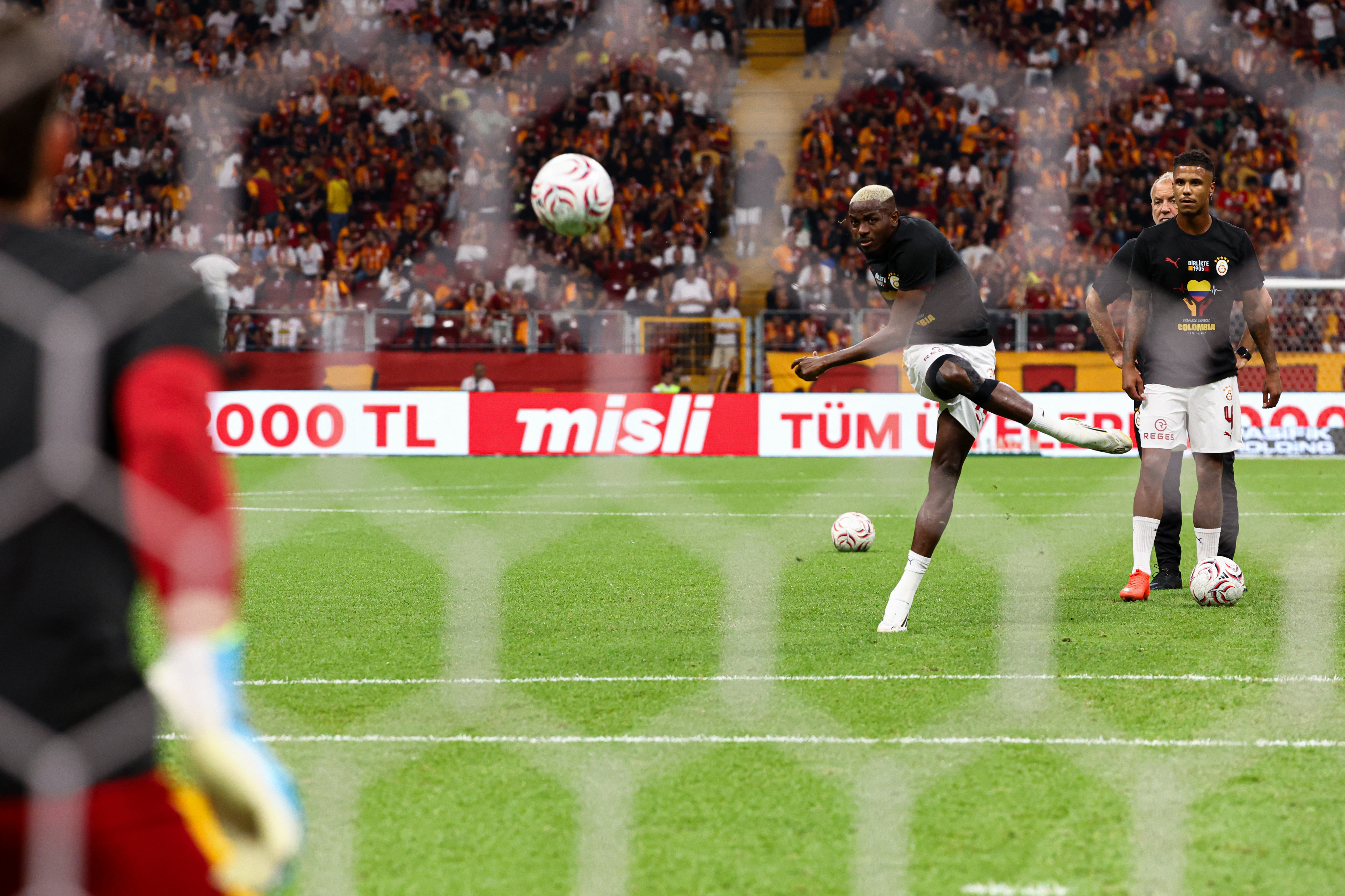 Victor Osimhen of Galatasaray SK kicks the ball during the warm-up. Galatasaray and Corum FK faced each other at 1st week of Trendyol Super League 2026/27. The match took place in Ali Sami Yen Rams Park Stadium on August 14th, 2026. (Photo by Burak Basturk / Middle East Images via AFP)