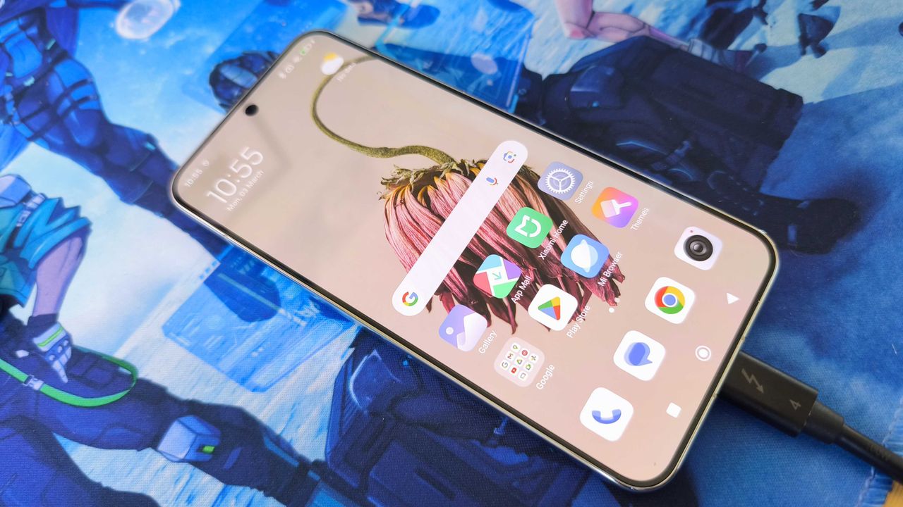 A liquid silver Xiaomi 15 on a detailed blue background