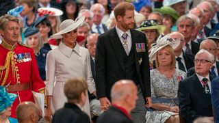 Prince Harry, Duke of Sussex and Meghan, Duchess of Sussex attend the service of thanksgiving for the Queen