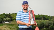 Alex Fitzpatrick with the Hero Indian Open trophy