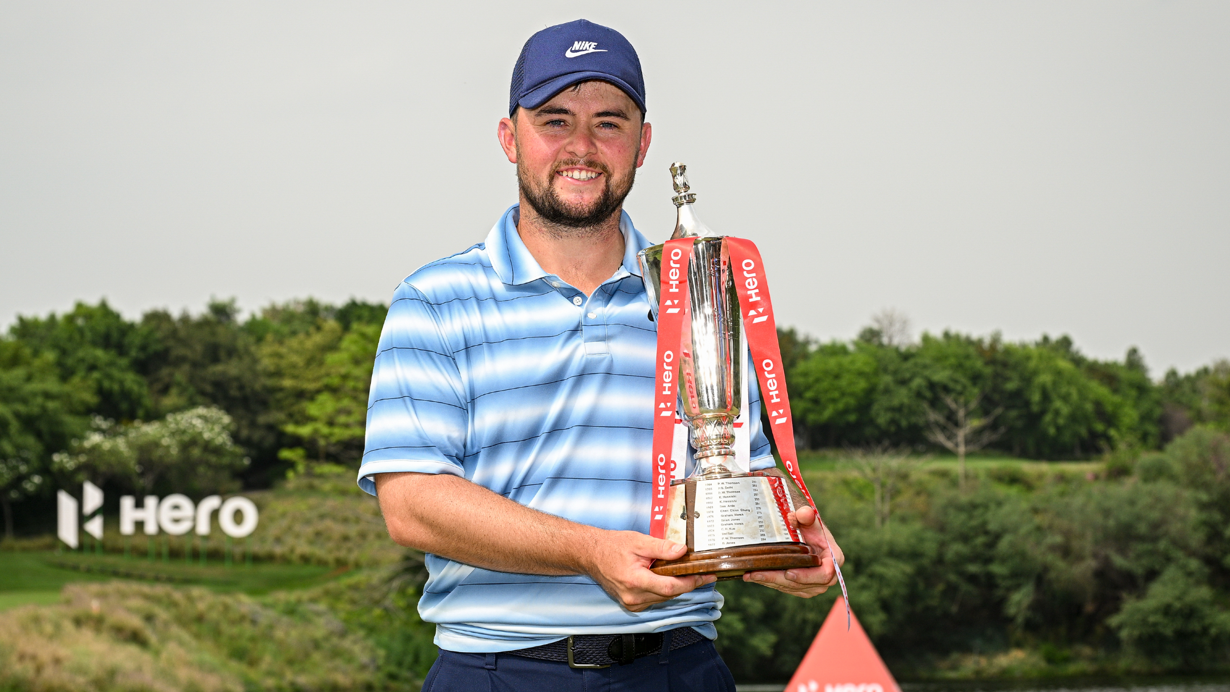 Alex Fitzpatrick with the Hero Indian Open trophy