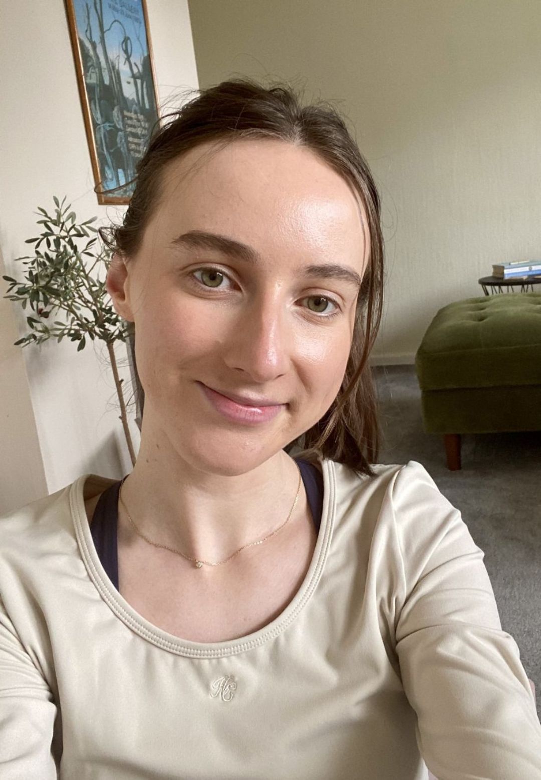 Health writer Katie Sims trying Pilates the spine twist supine every day