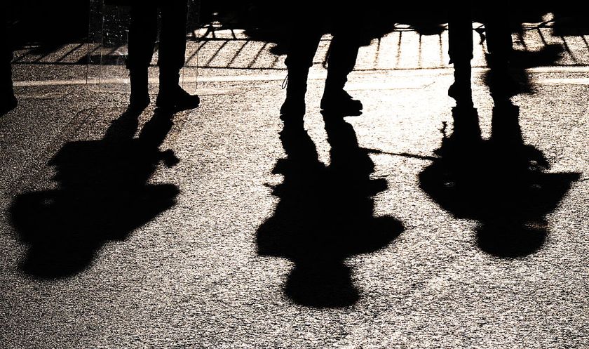 MADRID, SPAIN - SEPTEMBER 14: Police silhouettes during the La Vuelta - 80th Tour of Spain 2025, Stage 21 a 108km stage from Alalpardo to Madrid / The race is neutralised due to disturbances in central Madrid caused by pro-Palestinian protests / #UCIWT / on September 14, 2025 in Madrid, Spain. (Photo by Tim de Waele/Getty Images)