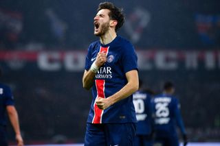 Khvicha Kvaratskhelia of PSG celebrates after scoring his team's second goal during the Ligue 1 match between Paris Saint-Germain FC and AS Monaco FC at Parc des Princes on February 07, 2025 in Paris, France.