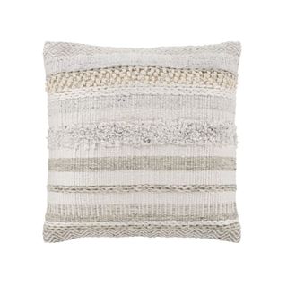 throw pillow with neutral colors and different striped textures