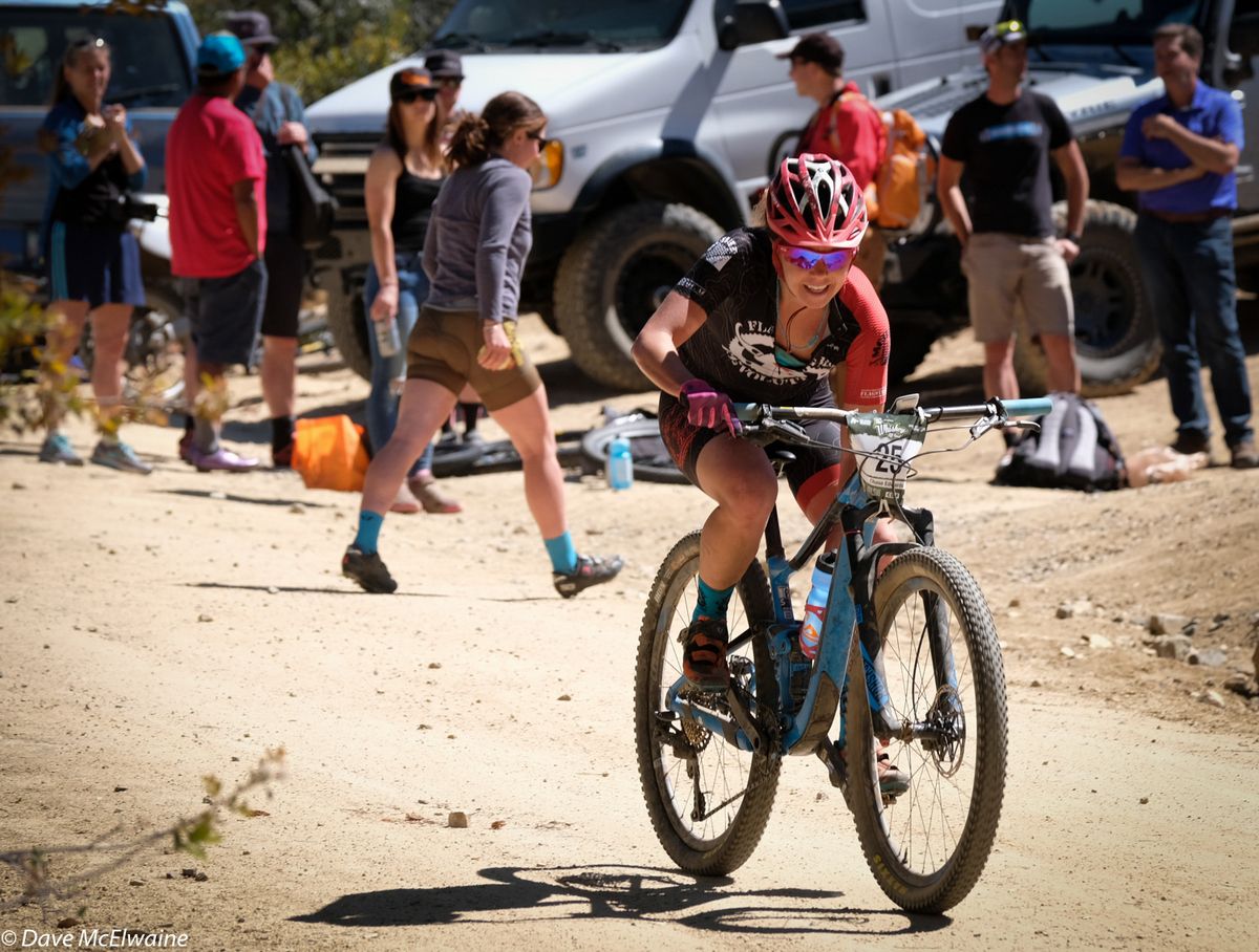 Chase Edwards grabbing a bottle at one of the aid stations