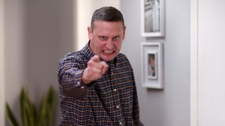 Tim Robinson as Tim, pointing towards the camera, in episode 302 of I Think You Should Leave
