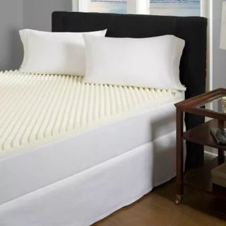 Enhance Highloft 2" Memory Foam Topper on a bed.