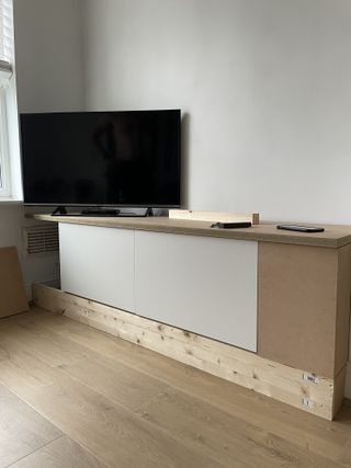 A TV stand in the process of being renovated