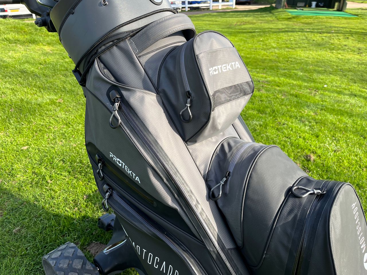 A view of the front pockets on the Motocaddy Protekta cart bag