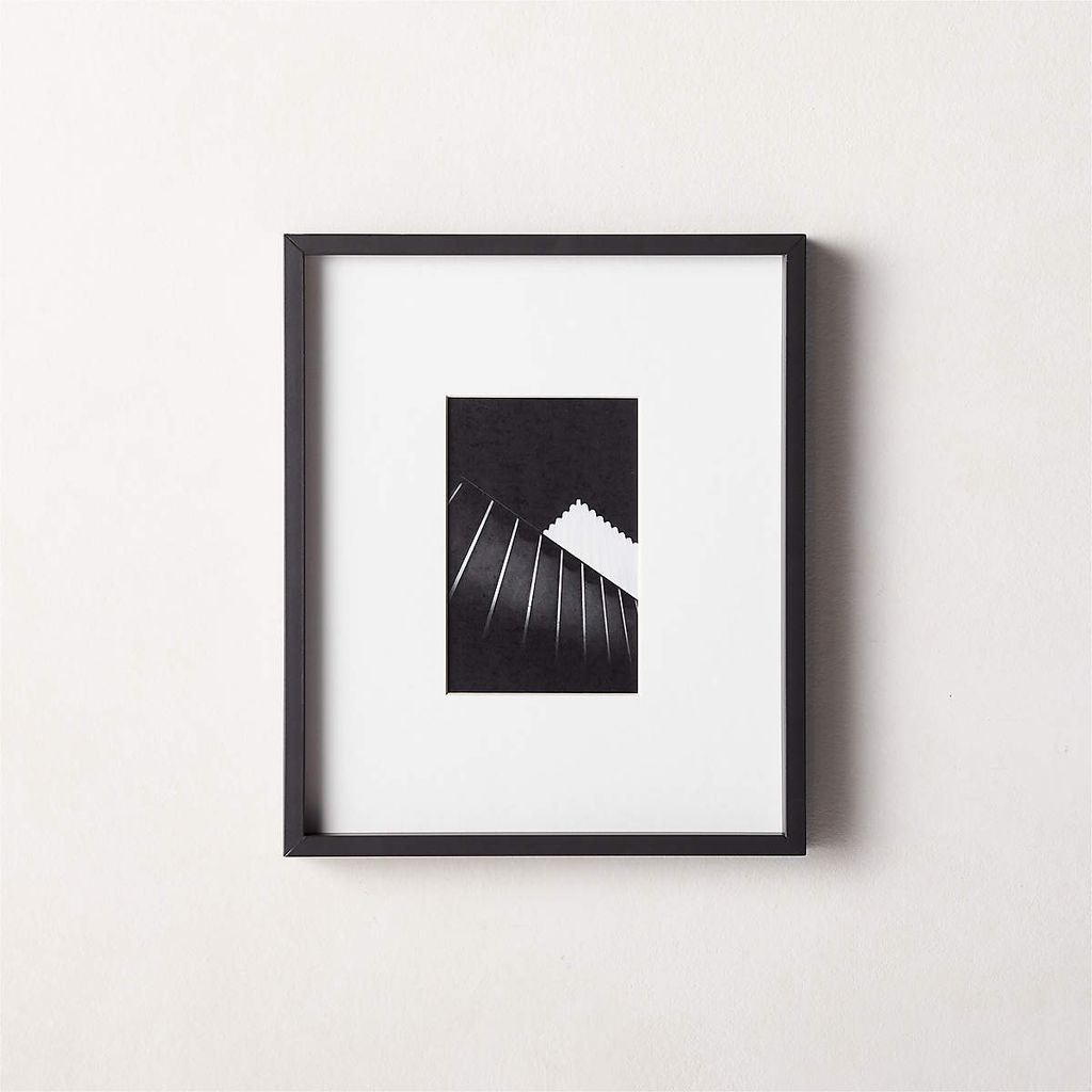 Expert interior designer shares 'easy' way to hang art Homes and Gardens