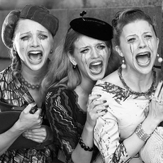 women not wearing waterproof mascara and crying