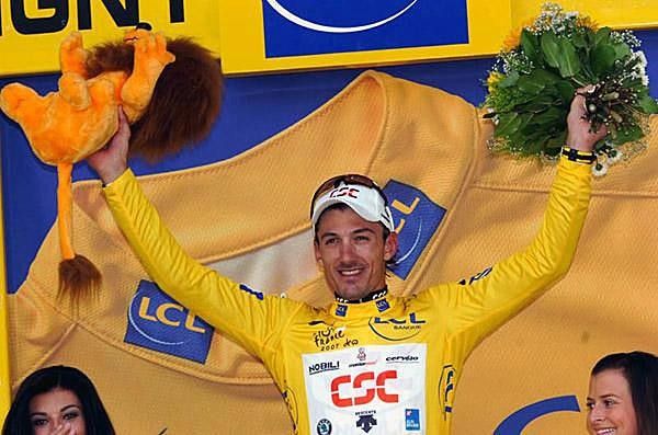 Fabian Cancellara (CSC) stands atop the leader's podium