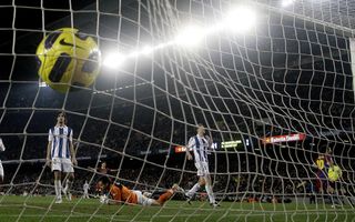 Lionel Messi (right) scores an impressive solo goal against Real Sociedad for Barcelona at Camp Nou in 2010.