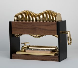 Wooden & gold mechanical box