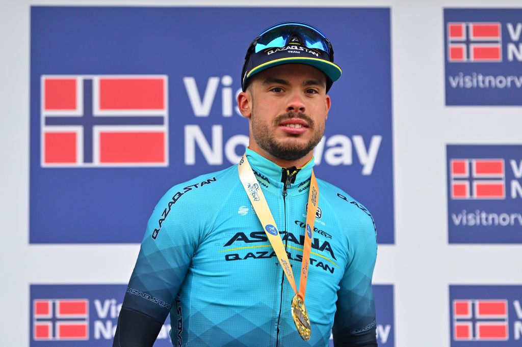HAMMERFEST NORWAY AUGUST 18 Michele Gazzoli of Italy and Astana Qazaqstan Team celebrates at podium as stage winner during the 10th Arctic Race of Norway Stage 2 a 1534km stage from Alta to Hammerfest on August 18 2023 in Hammerfest Norway Photo by Luc ClaessenGetty Images