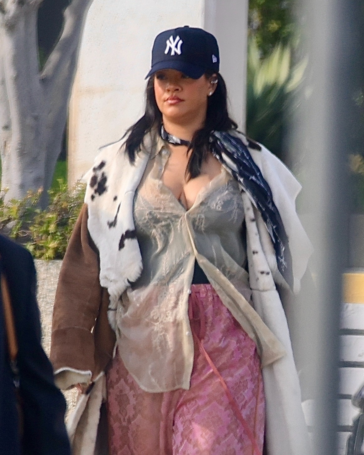 Rihanna was spotted wearing an animal-print fur coat and pajama-inspired pants