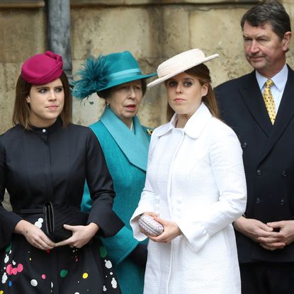 Princess Beatrice and Princess Eugenie standing with the Royal Family on Easter