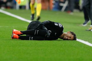 Neymar of Paris Saint-Germain complaints about an injury on the ground during the UEFA Champions League Round of 16 First Leg match between Real Madrid and Paris Saint-Germain at Bernabeu on February 14, 2018 in Madrid, Spain.