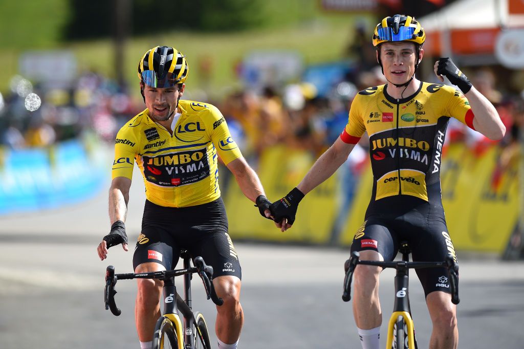 PLATEAU DE SALAISON FRANCE JUNE 12 LR Race winner Primoz Roglic of Slovenia Yellow Leader Jersey and stage winner Jonas Vingegaard Rasmussen of Denmark and Team Jumbo Visma celebrate at finish line during the 74th Criterium du Dauphine 2022 Stage 8 a 1388km stage from SaintAlbanLeysse to Plateau de Salaison 1495m WorldTour Dauphin on June 12 2022 in Plateau de Salaison France Photo by Dario BelingheriGetty Images
