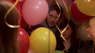 Chris Pratt and Aubrey Plaza in a room of balloons in Parks and Rec