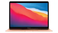 A pink MacBook Air M1 with a colorful desktop background