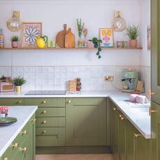 Green shaker kitchen with open shelving