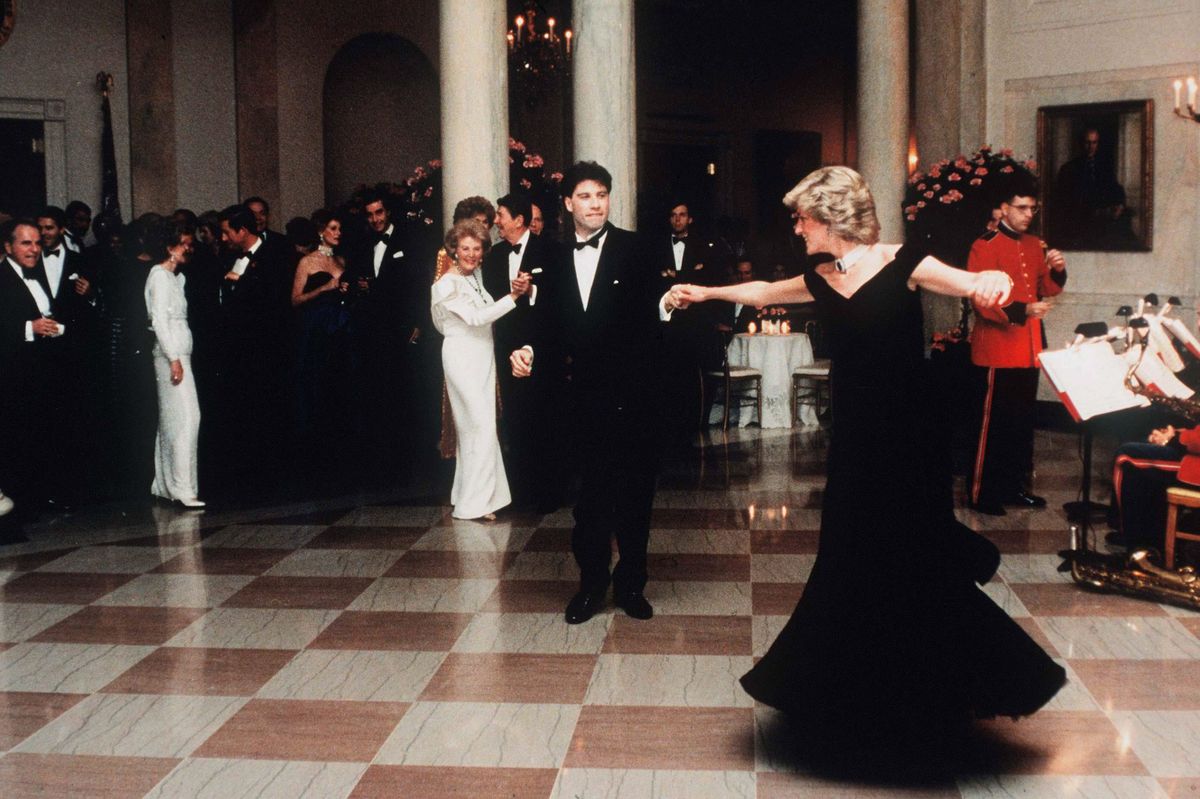 The story behind this iconic photograph of Princess Diana and John Travolta