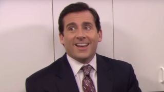Michael smiling while telling story on The Office