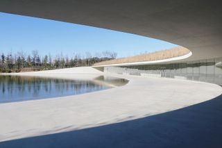 inside the minimalist curves of the water museum