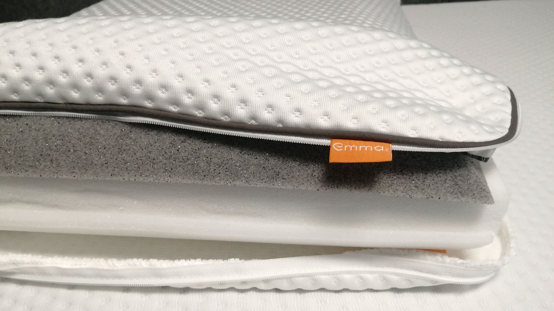 Emma Premium Pillow unzipped to show foam layers inside