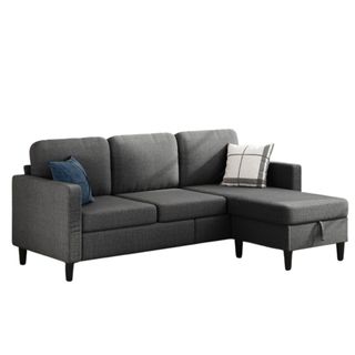 A dark gray three-seat couch