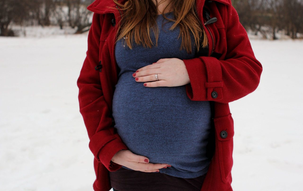 pregnant in coat