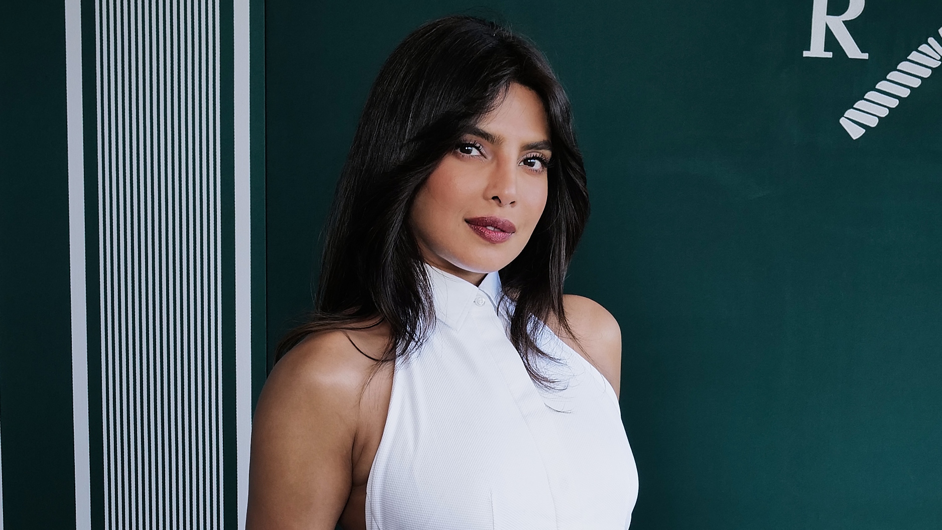 Priyanka Chopra wearing a white dress at Wimbledon on July 02, 2025 in London